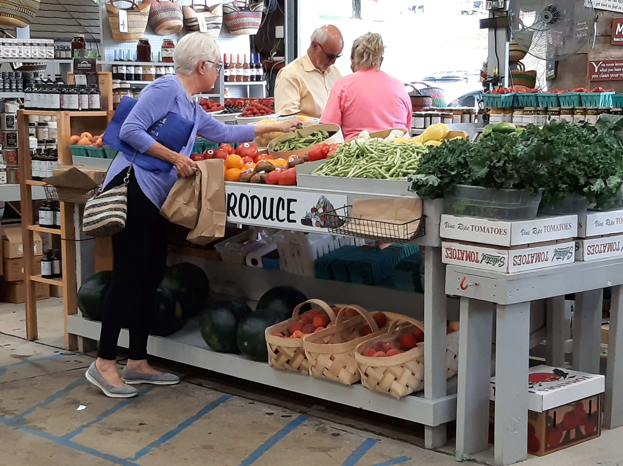WNC Farmer's market customer picking produce - Mrs. HomeFree